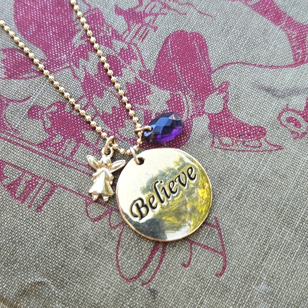 Avon Gold Tone Believe Croire Reversible Disc Angel Purple Bead Charm Necklace